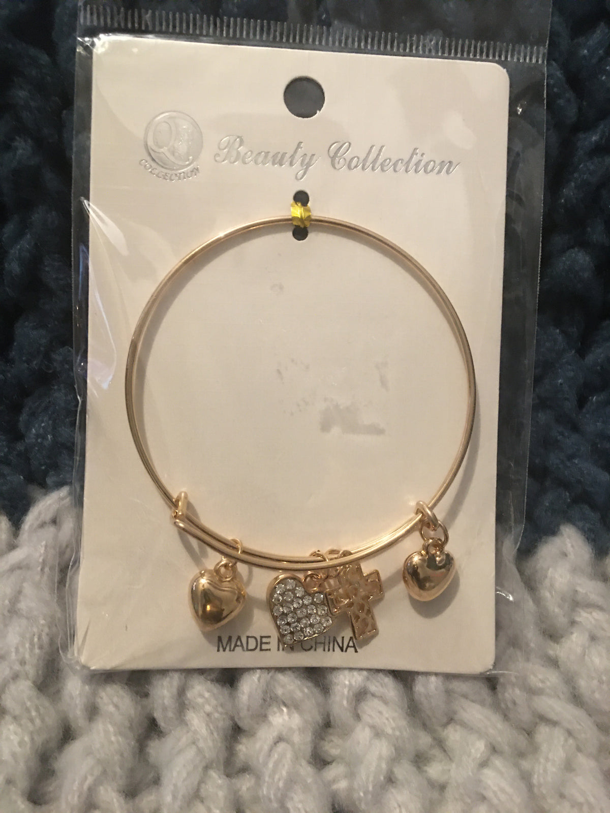 Brazalete de corazón y cruz