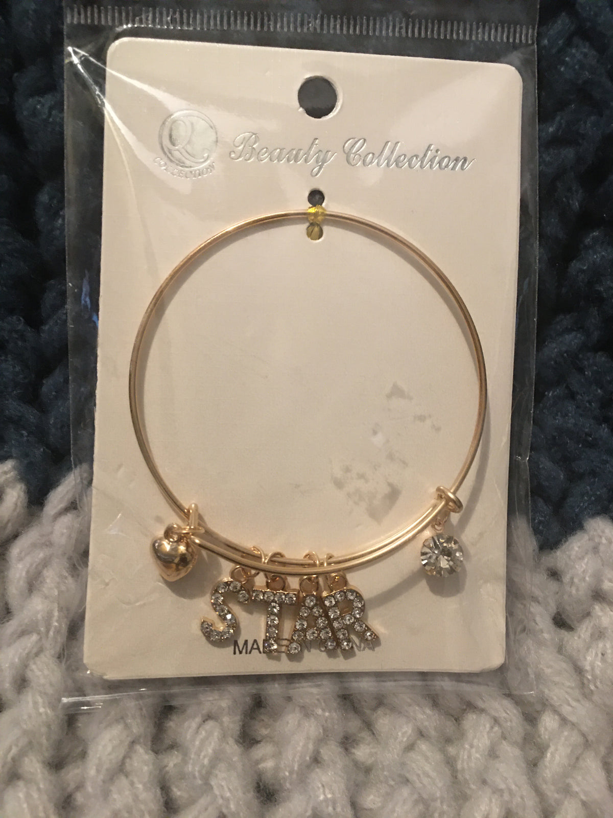 Brazalete de estrella de oro