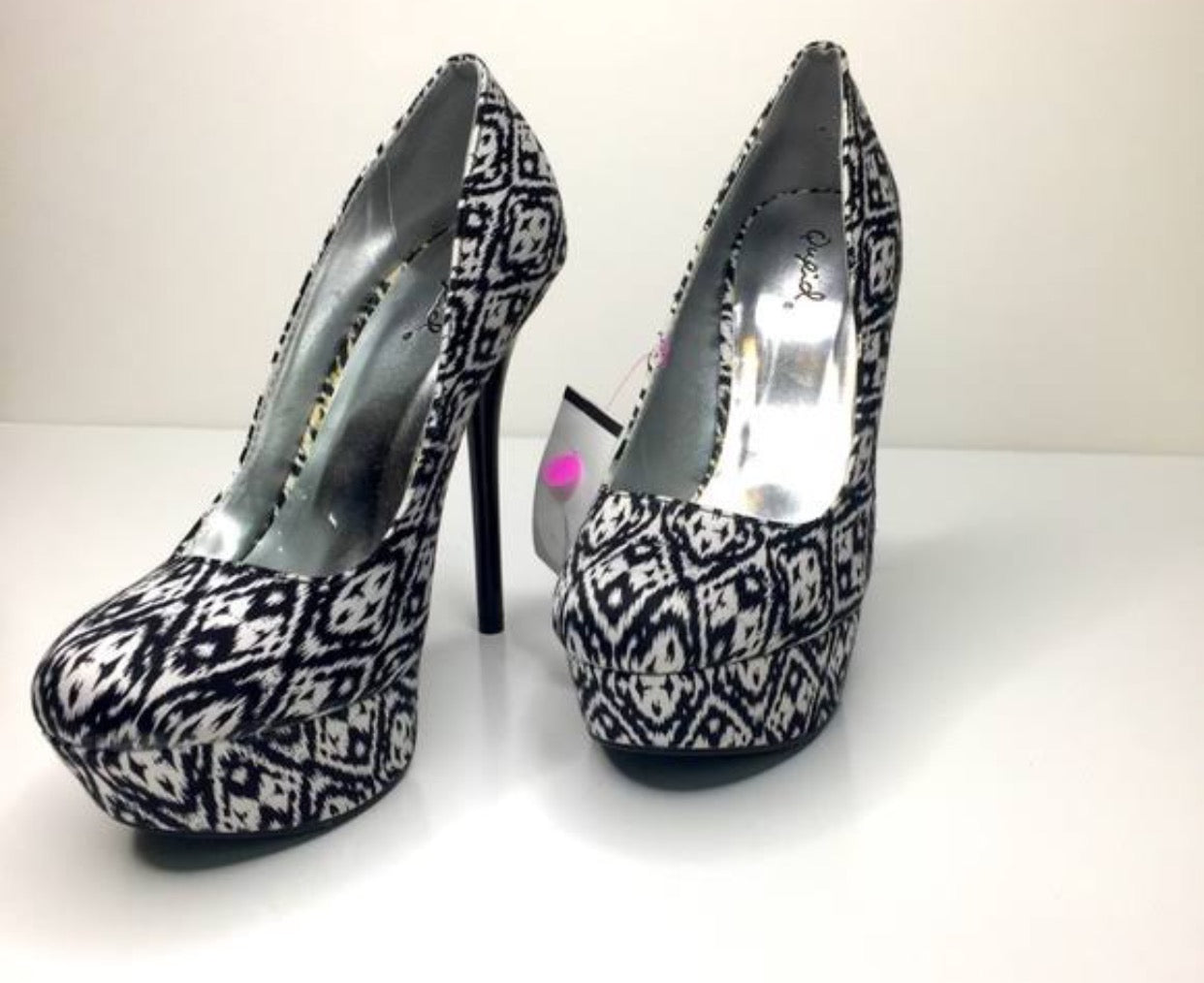 Black and white Qupid heels